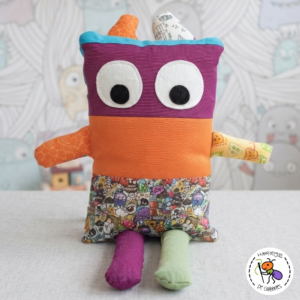 Peluche multicolor graffiti